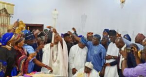 Peace, as Makinde, Olubadan present beaded crown, instrument of office to Oba Ladoja